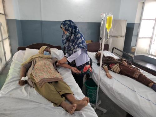 LADY PATIENTS BEING ADMINISTERED DRIP IN THE WARD
